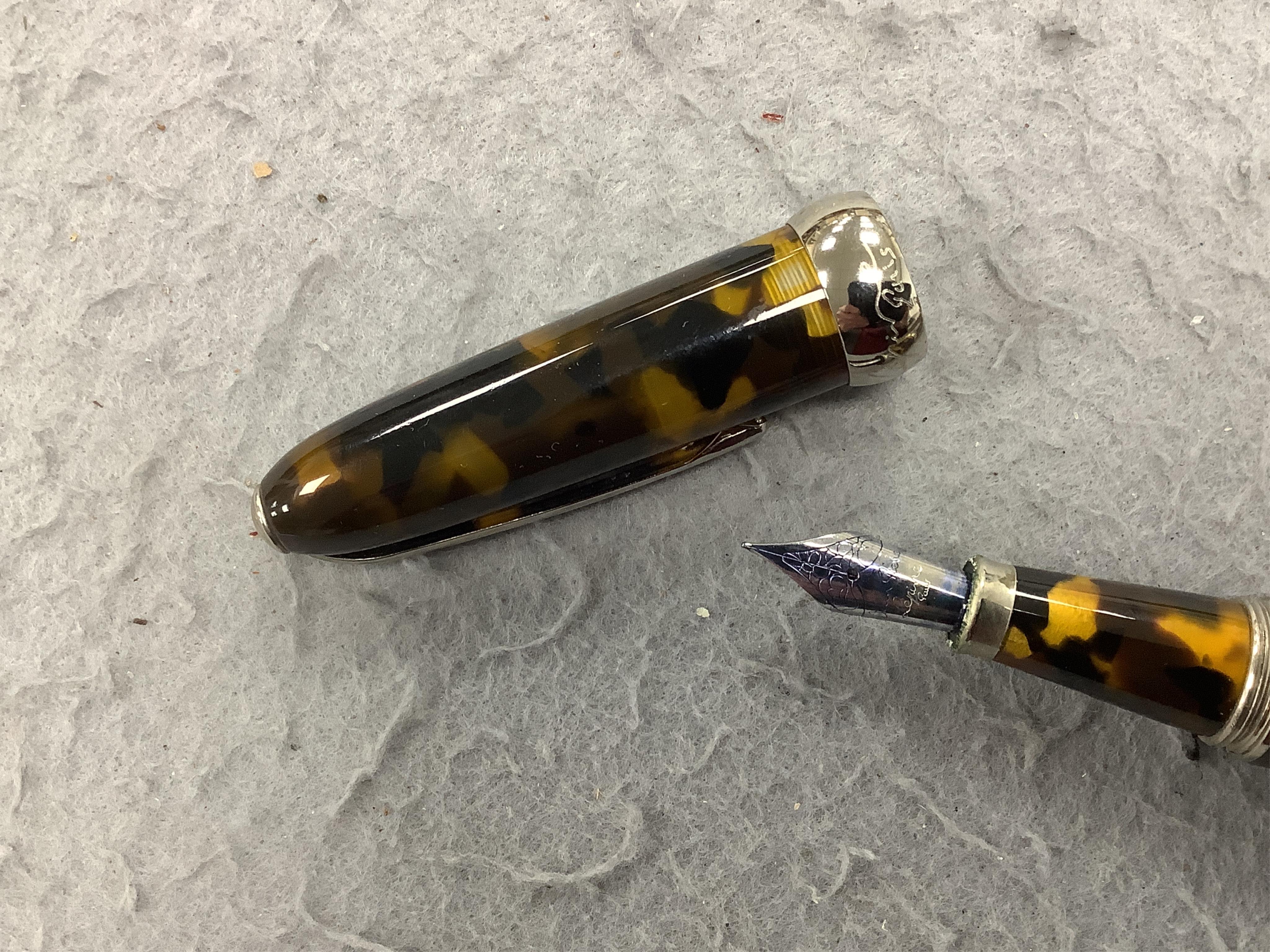 A Montblanc 146 vintage fountain pen, in original case, along with Aurora fountain pen and two others (4)
